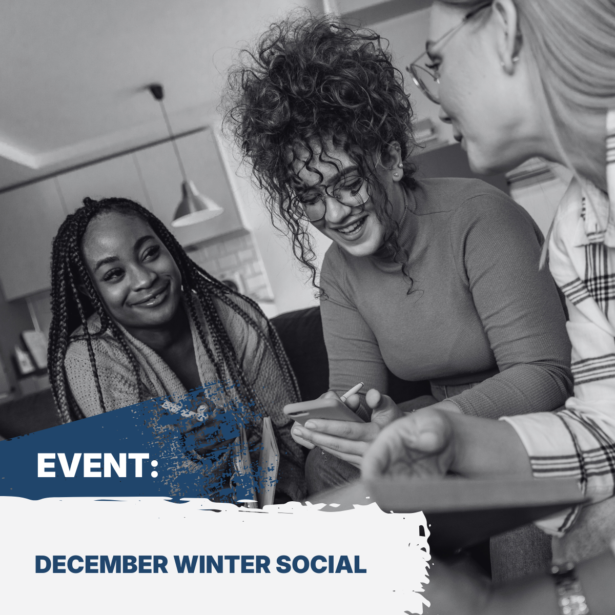 Three people looking down and smiling, talking to eachother